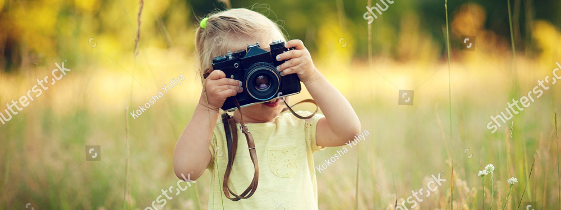 Kind mit Kamera